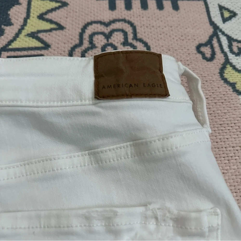 American Eagle White Stretch Ripped Super Hi-Rise Jegging Crop Jeans - Picture 15 of 16